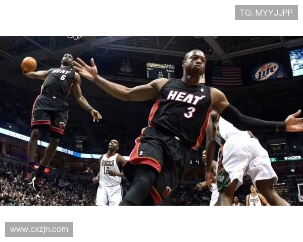 全明星赛场边詹姆斯与韦德亲密互动击掌拥抱引发球迷热议 全明星赛场边詹姆斯与韦德亲密互动击掌拥抱引发球迷热议